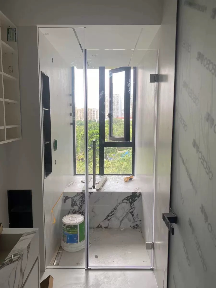Installed clear glass shower enclosure field reference