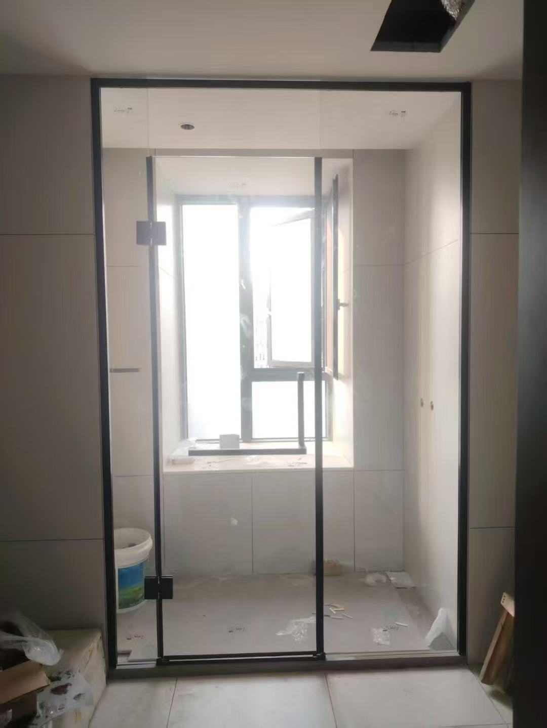 Installed black framed shower enclosure field reference